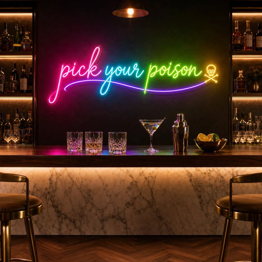 Pick Your Poison gradient neon sign behind a marble home bar counter