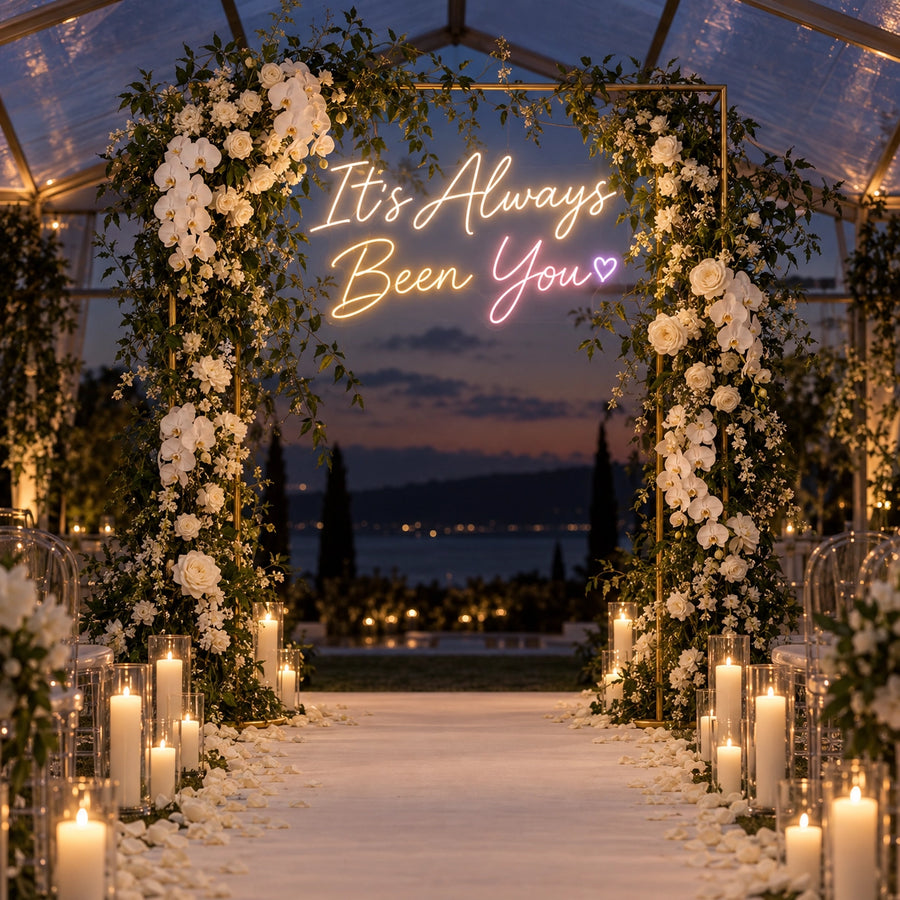 It's Always Been You wedding neon sign in warm white, champagne, pink and lilac for ceremony arch