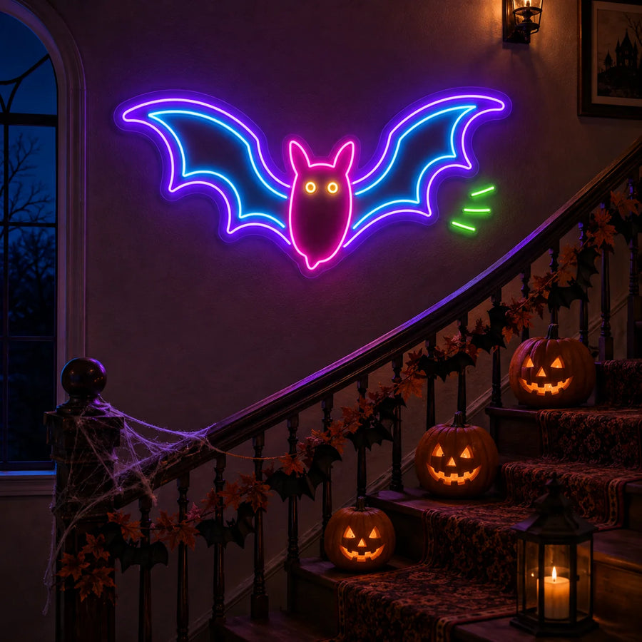 Neon bat sign with spread wings glowing on a staircase wall with Halloween decor