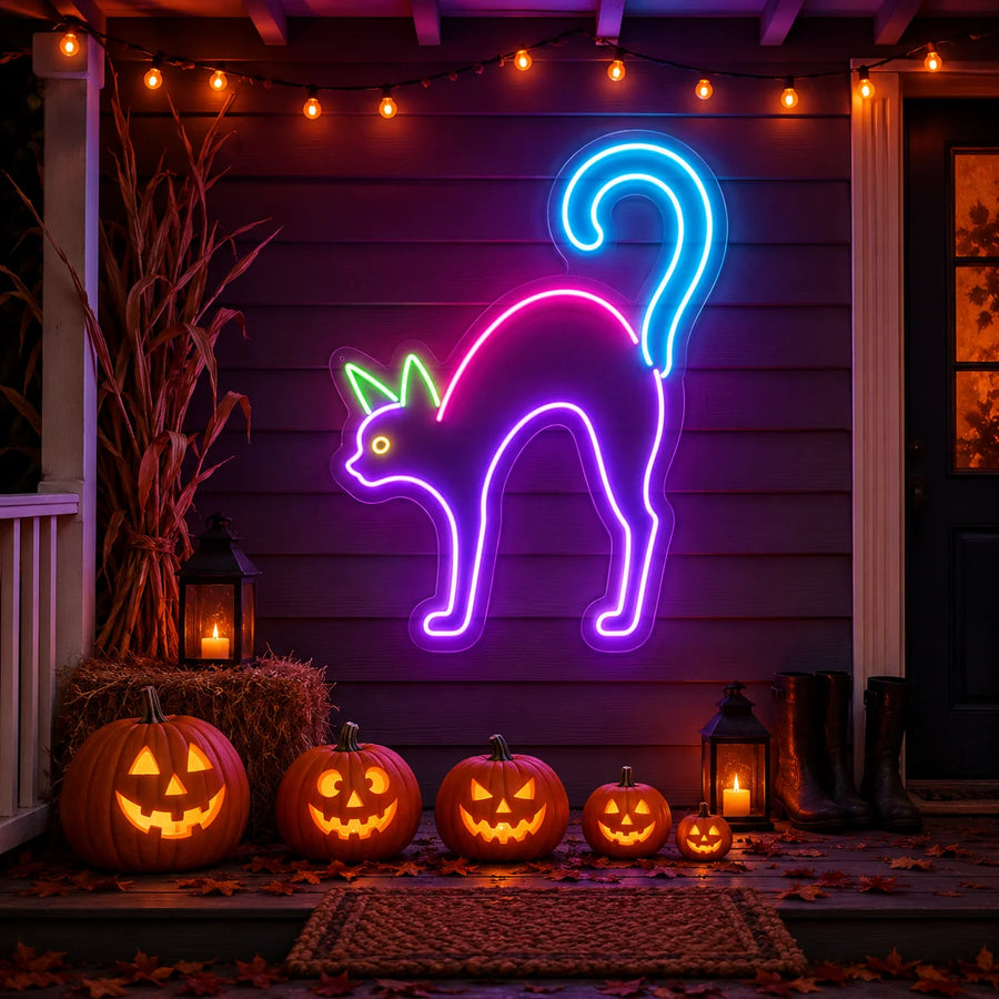 Neon cat Halloween sign glowing on a porch with pumpkins and autumn decor
