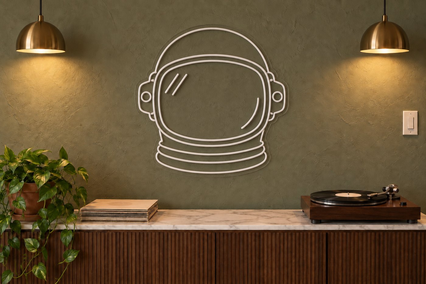 Custom neon astronaut helmet sign switched off, matte white tube on clear acrylic in a warmly lit room