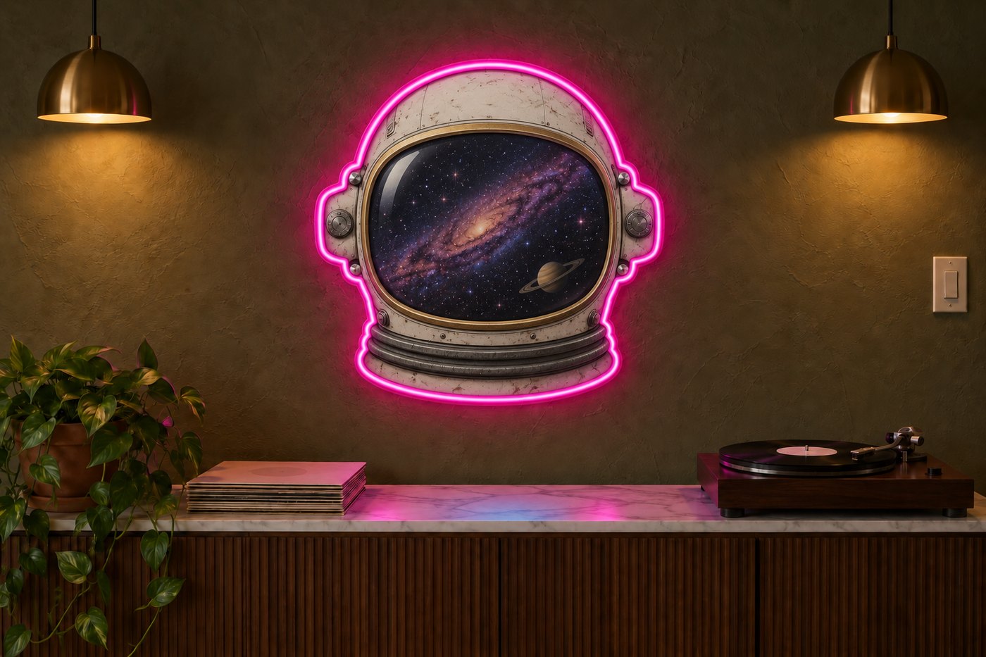 UV printed astronaut helmet sign lit in a dark room, a pink tube glowing around the printed galaxy visor